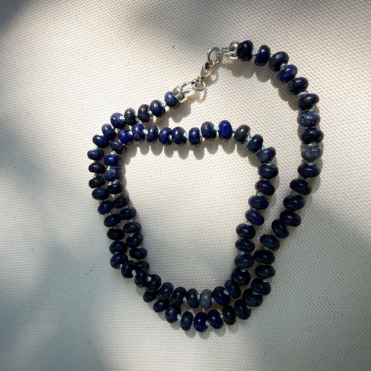 Lapis Azul rondelle beaded necklace hand knotted on pale blue sild thread. Natural Earth Collective Ohio