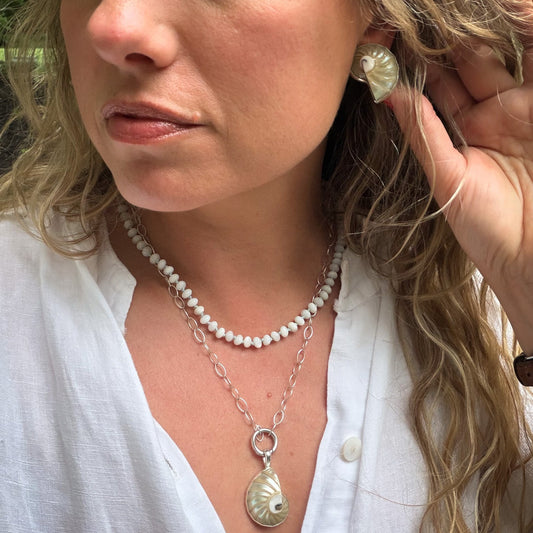 Nautilus shell pendant and stud earrings wrapped in sterling silver. Natural earth collective, Ohio