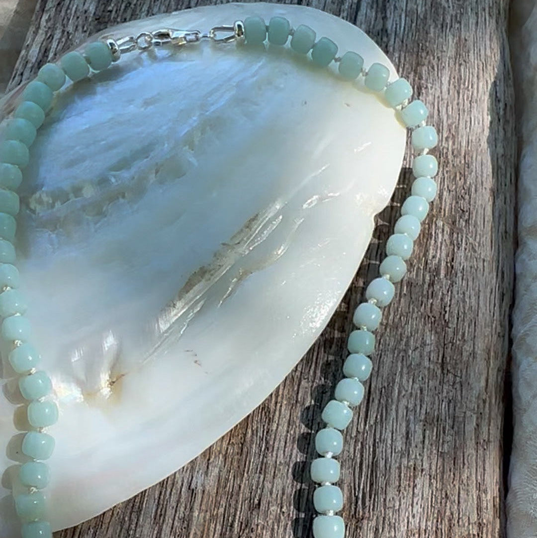 Pale green Amazonite drum beaded necklace, hand knotted on cream silk thread. Natural Earth Collective Ohio