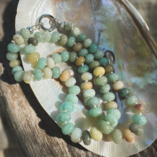 Multi shade Amazonite Beaded Necklace, hand knotted on cream silk thread with a circle push clasp that can be worn in back or front to accommodate a pendant. Natural Earth Collective, Ohio