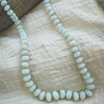 Pale green, graduated sized Amazonite beaded necklace, hand knotted on a beige sild thread. Natural Earth Collective Ohio
