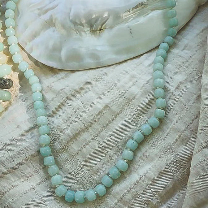 Pale green Amazonite drum beaded necklace, hand knotted on cream silk thread. Natural Earth Collective Ohio