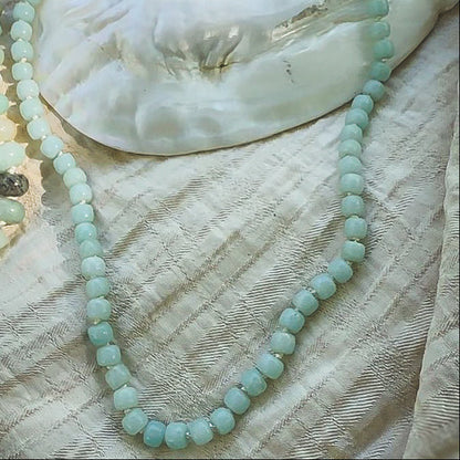 Pale green Amazonite drum beaded necklace, hand knotted on cream silk thread. Natural Earth Collective Ohio