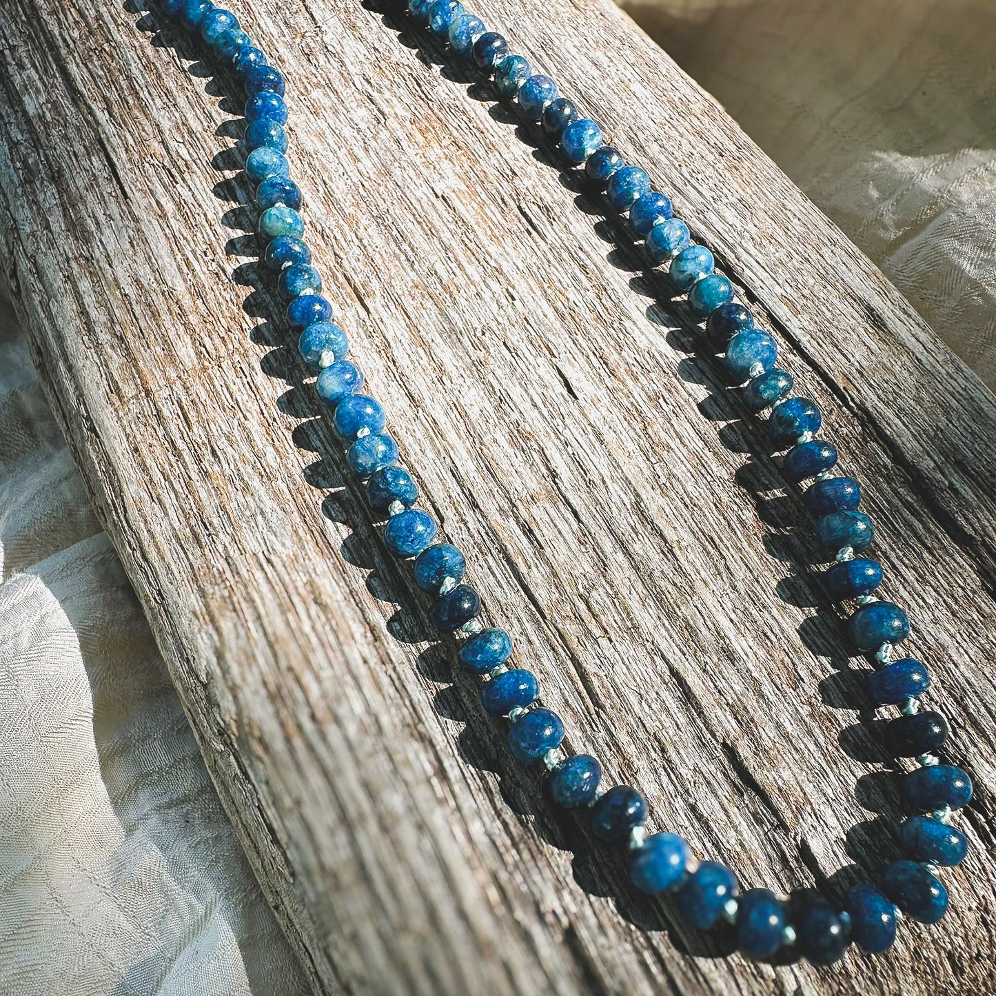 Blue Apatite Beaded necklace, hand knotted on light blue silk thread. Natuarl Earth Collective Ohio