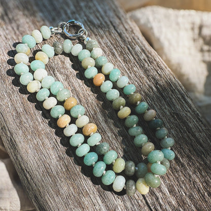 Multi shade Amazonite Beaded Necklace, hand knotted on cream silk thread with a circle push clasp that can be worn in back or front to accommodate a pendant. Natural Earth Collective, Ohio
