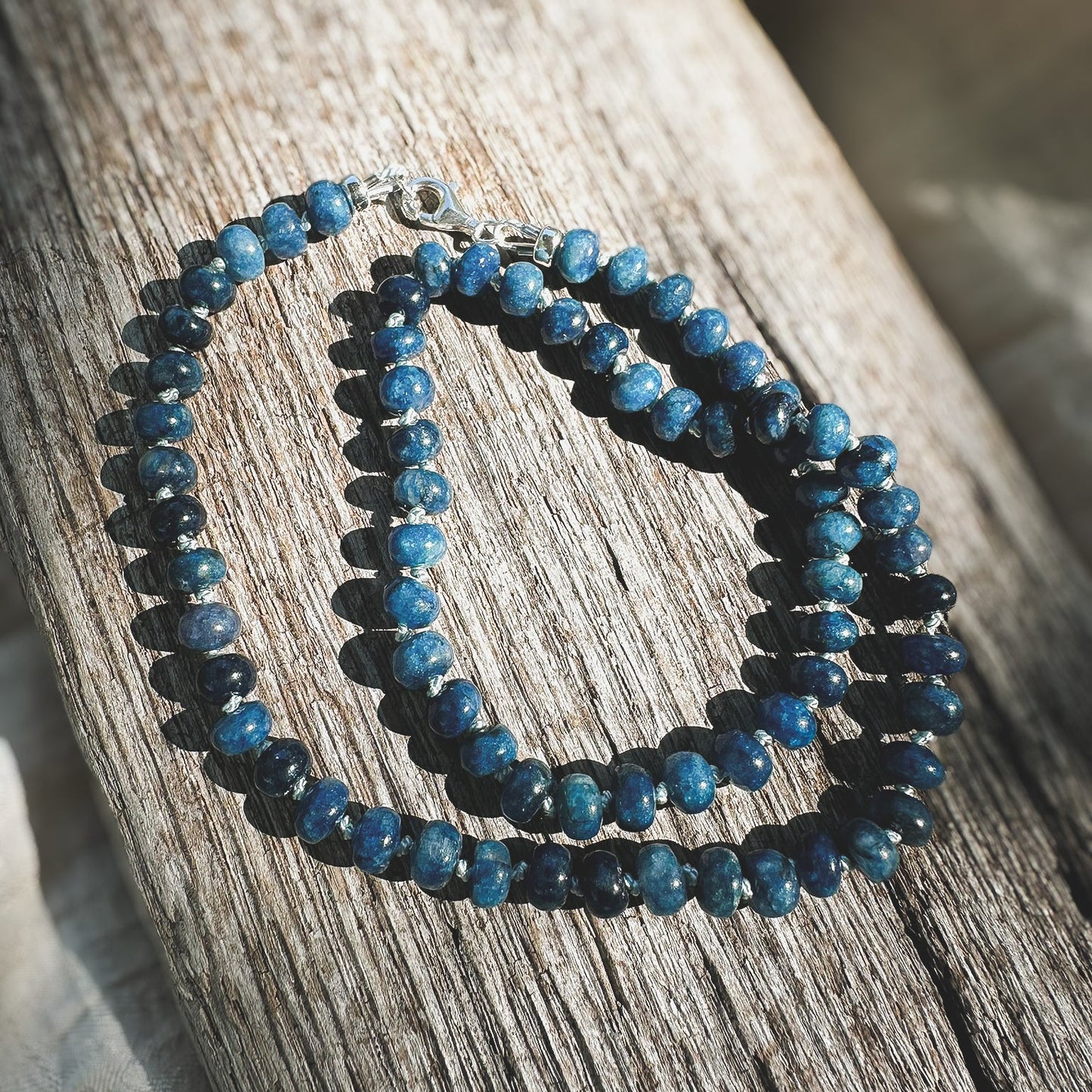 Blue Apatite Beaded necklace, hand knotted on light blue silk thread. Natuarl Earth Collective Ohio