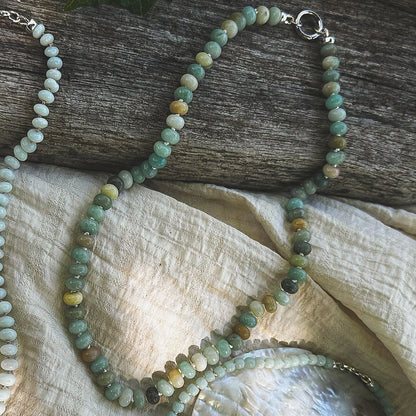 Multi shade Amazonite Beaded Necklace, hand knotted on cream silk thread with a circle push clasp that can be worn in back or front to accommodate a pendant. Natural Earth Collective, Ohio