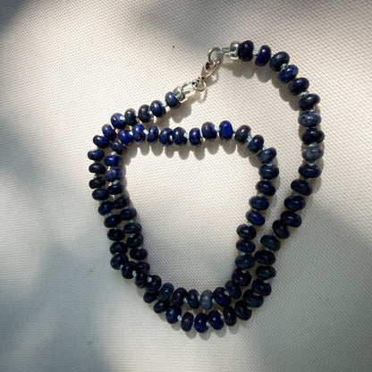 Lapis Azul rondelle beaded necklace hand knotted on pale blue sild thread. Natural Earth Collective Ohio
