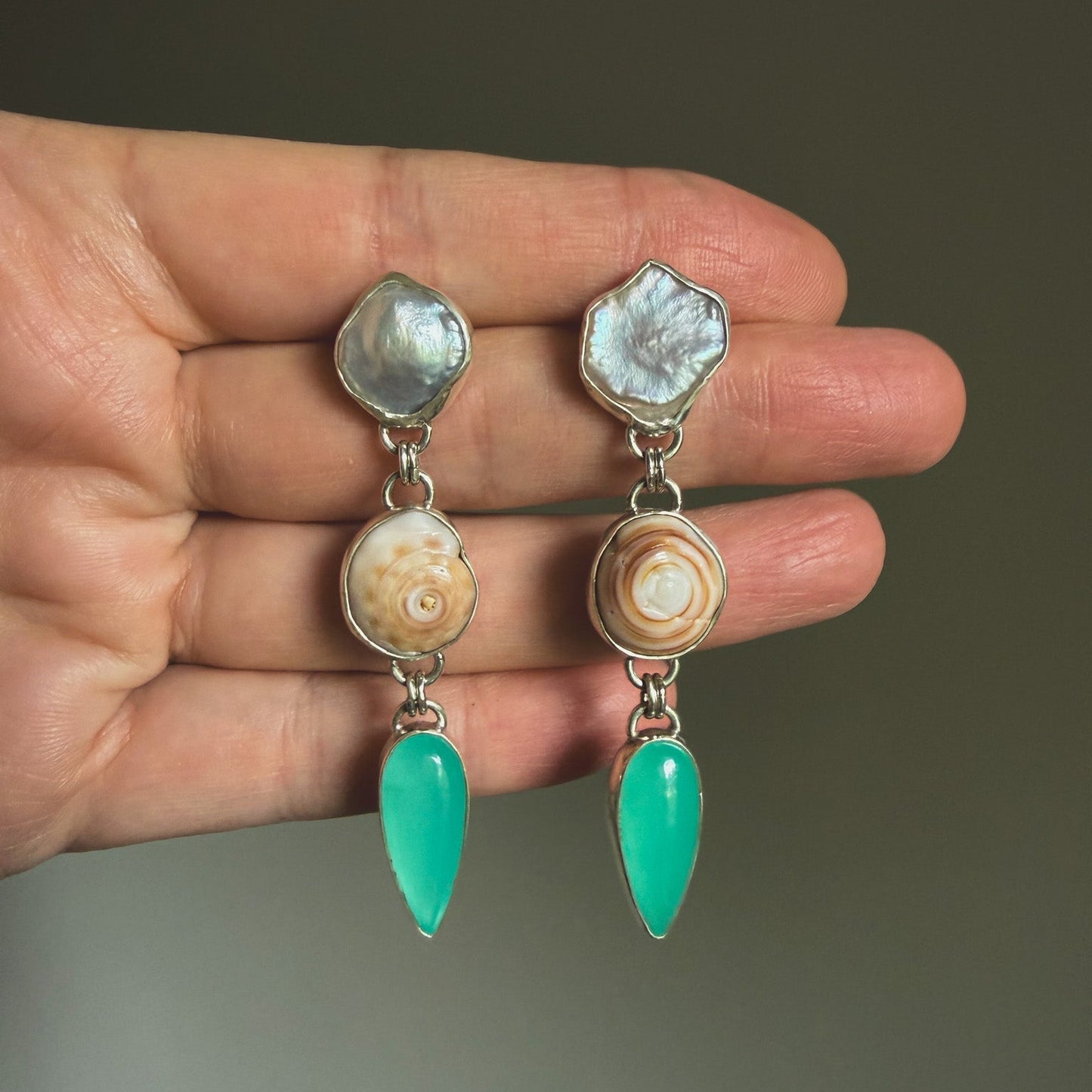 Pearl, puka shell, teal chalcedony tiered dangle earrings in sterling slilver earrings. Natural earth collective OH