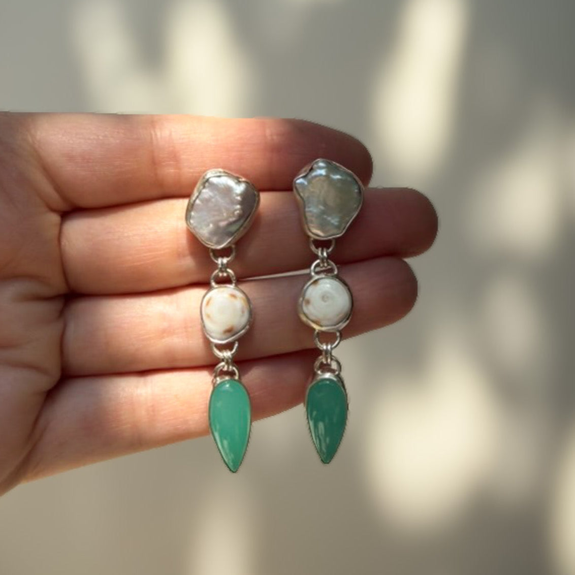 pearl puka shell and aqua chalcedony tiered dangle post earrings set in sterling silver. Natural Earth Collective Ohio