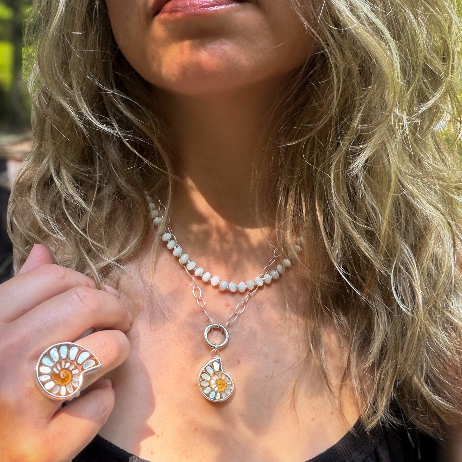 Ammonite fossil with inlaid mother of pearl pendandt set in sterling silver on a sterling silver chain with sterlin circle push clasp Natural Earth Collective Ohio