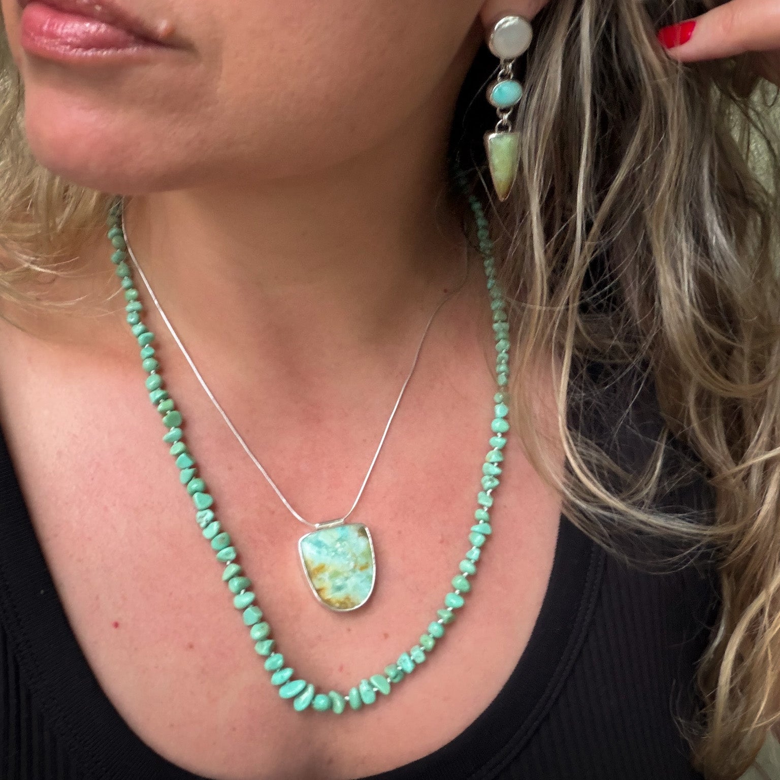 Opalized wood in shades of moss, yellow and aqua pendant  set in sterling silver on a sterling silver snake chain. Natural earth collective Ohio