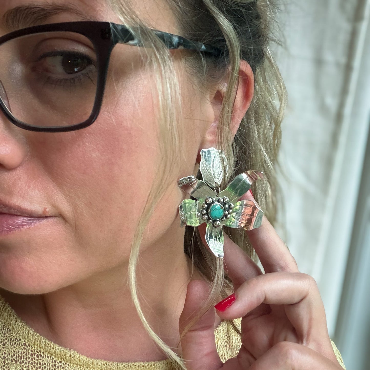 Close up sterling silver handcrafted flower statement  earrings set with # * mine turquoise - natural Earth collective jewelry Ohio