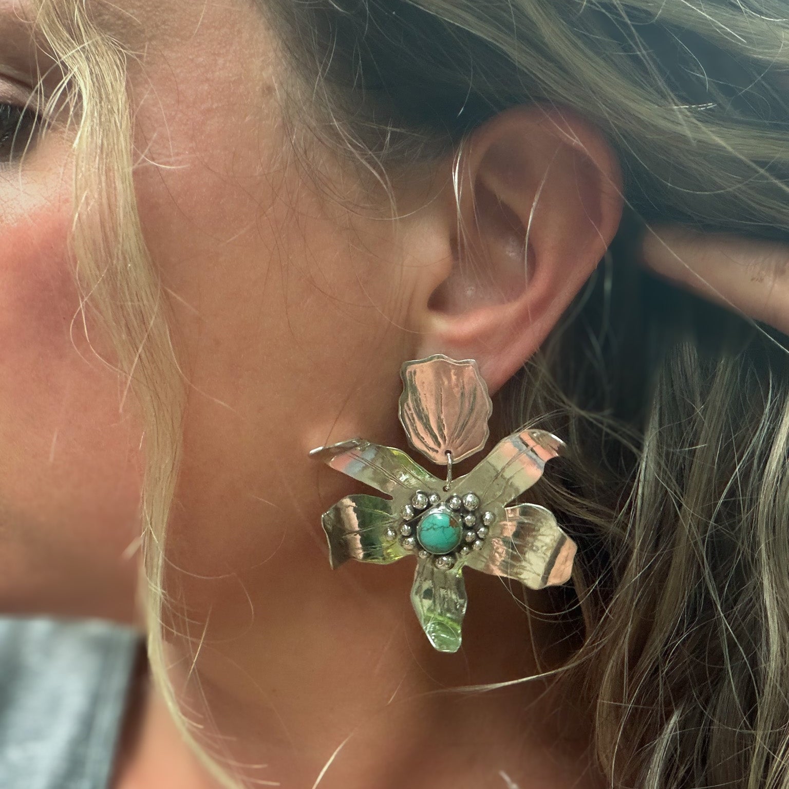 Close up sterling silver handcrafted flower statement  earrings set with # * mine turquoise - natural Earth collective jewelry Ohio